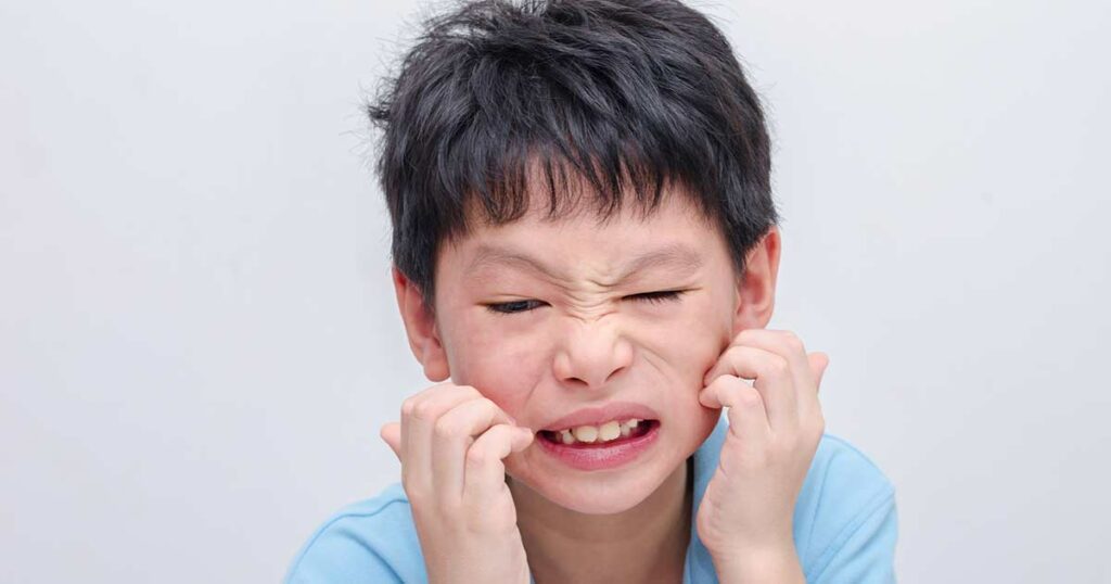 Close up of tween aged boy