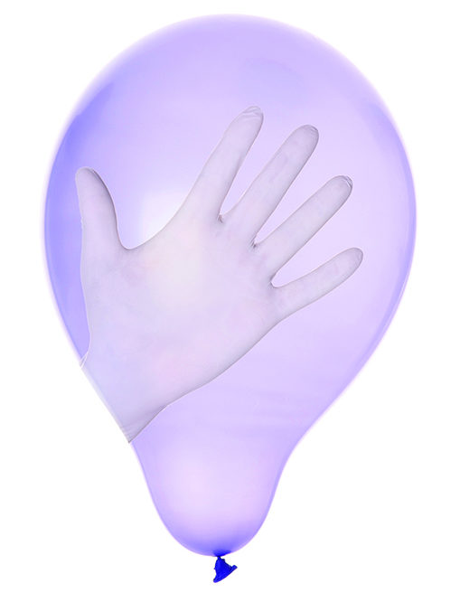 Photo of a latex balloon and a latex glove