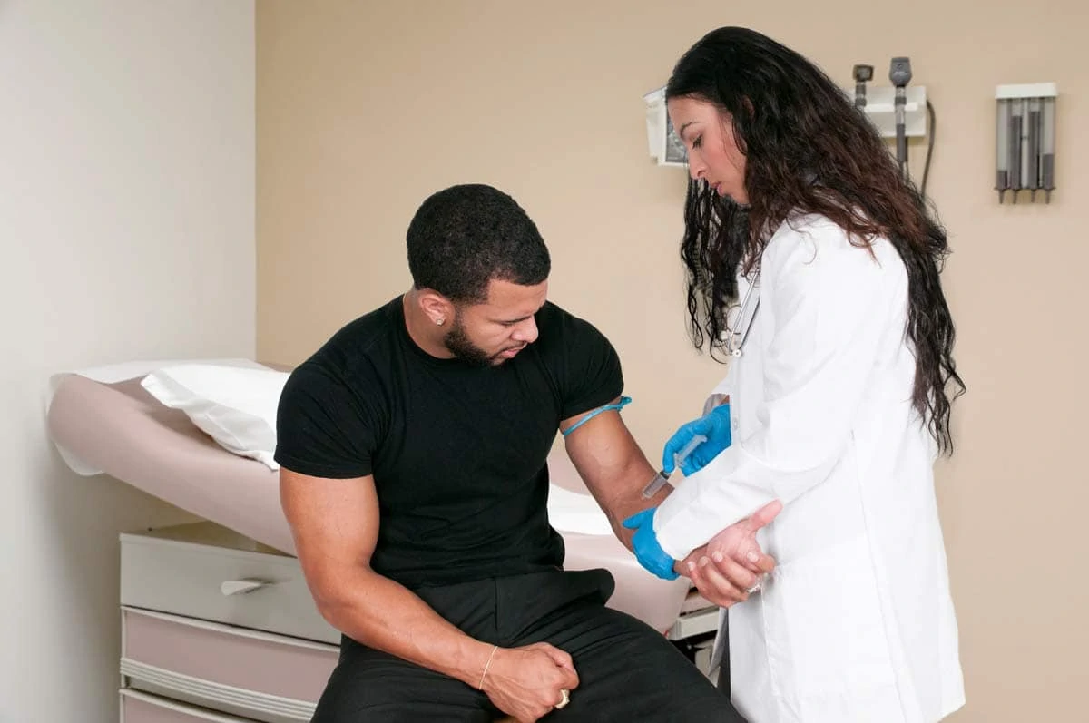 Photo icon of doctor giving man a Covid-19 vaccine