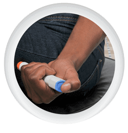 Photo icon of person injecting themselves with an epipen